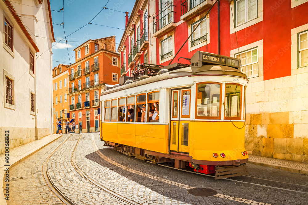 tram on narrow street of Alfama, Lisbon
