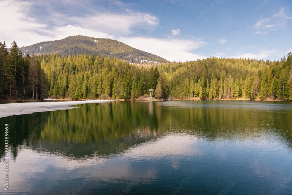 Lake Synevyr in the Ukrainian Carpathians. Spring, sunny day.