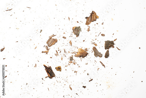 Crushed tree bark remains macro shot, small wood pieces splints isolated on white background
