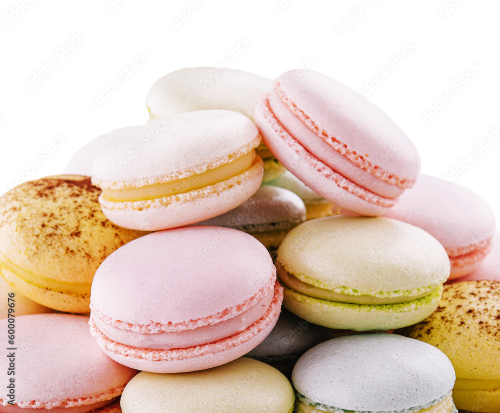 Multicolored macaroons on ceramic plate isolated on white Multicolored macaroons on ceramic plate isolated on white