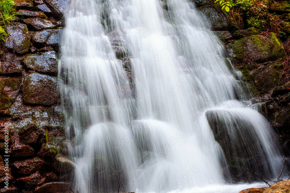 beautiful waterfall in the Cindrel mountains of Romania