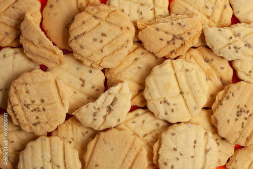Closeup of a group of assorted carrom seeds cookies or salted ajwain cookies. Top view.