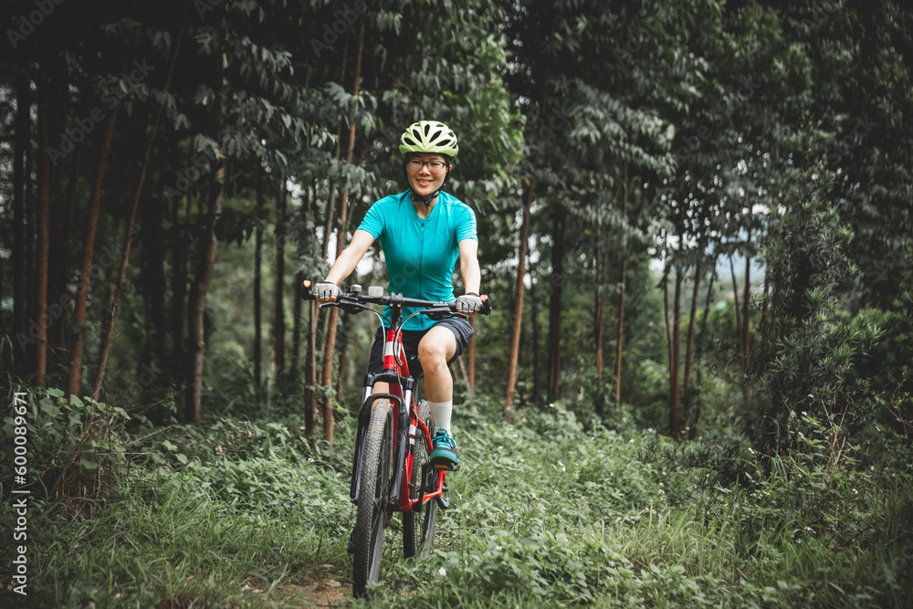 Riding bike in spring forest Riding bike in spring forest