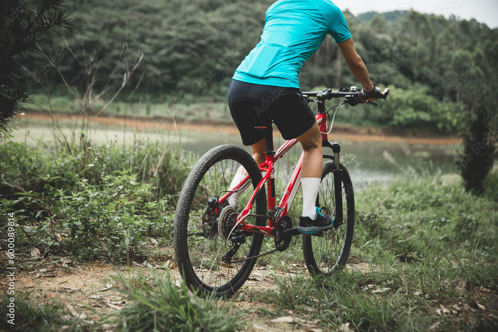 Riding bike in spring forest Riding bike in spring forest