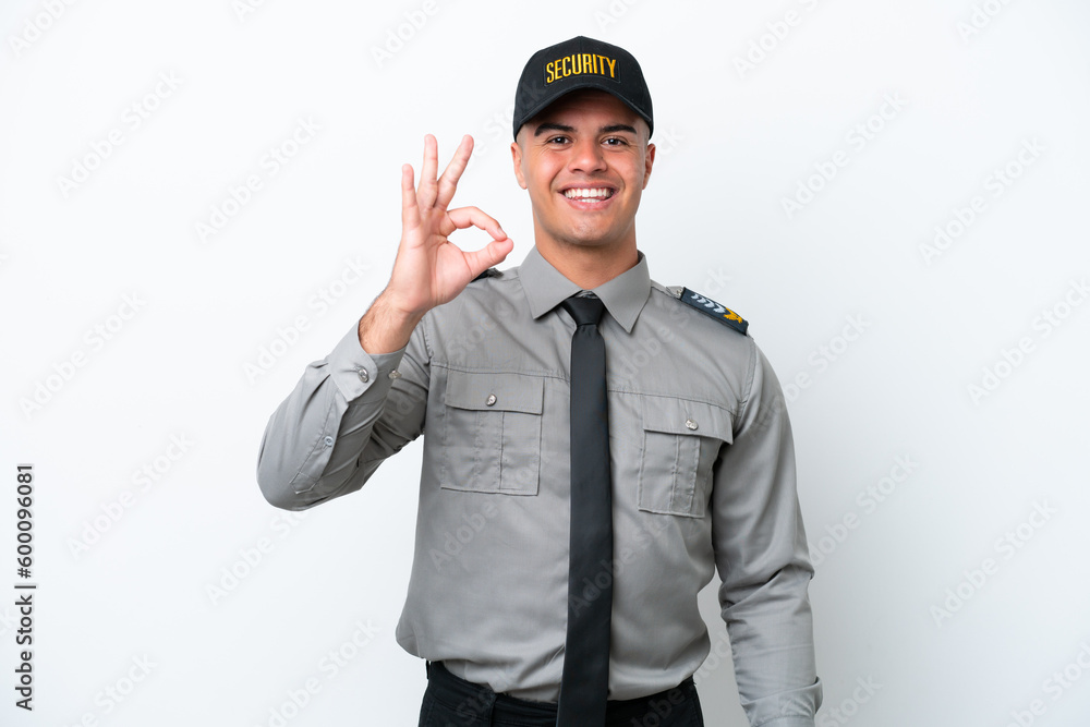 Young caucasian security man isolated on white background showing ok sign with fingers Young caucasian security man isolated on white background showing ok sign with fingers