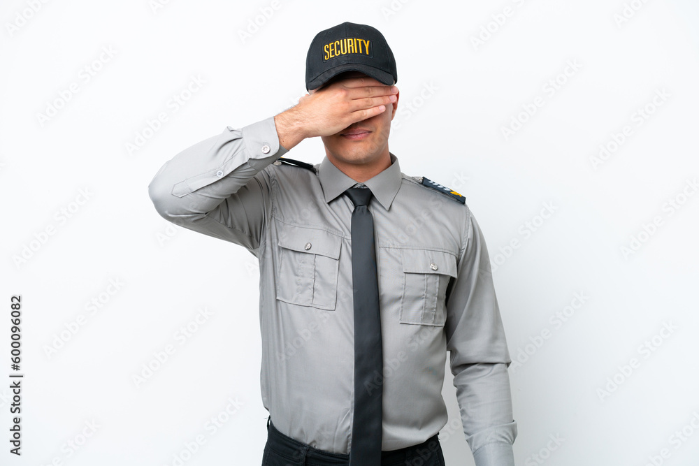 Young caucasian security man isolated on white background covering eyes by hands. Do not want to see something Young caucasian security man isolated on white background covering eyes by hands. Do not want to see something