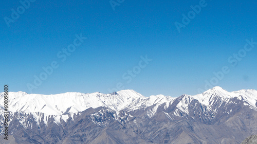 Scenic high altitude mountain road at Ladakh India with view of the Himalayan mountain range.