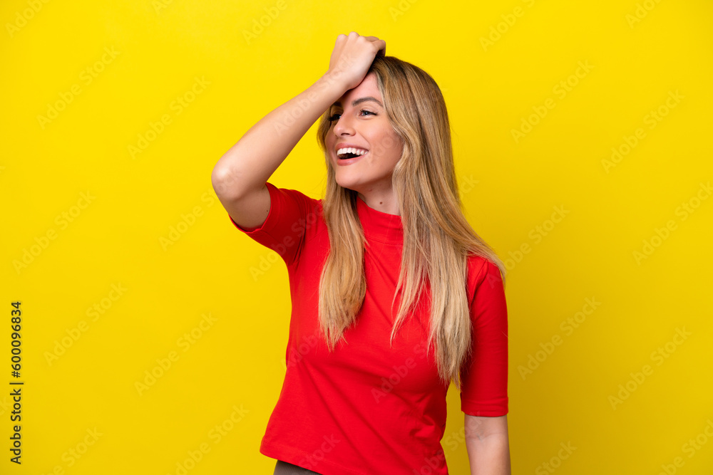 Young Uruguayan woman isolated on yellow background has realized something and intending the solution Young Uruguayan woman isolated on yellow background has realized something and intending the solution