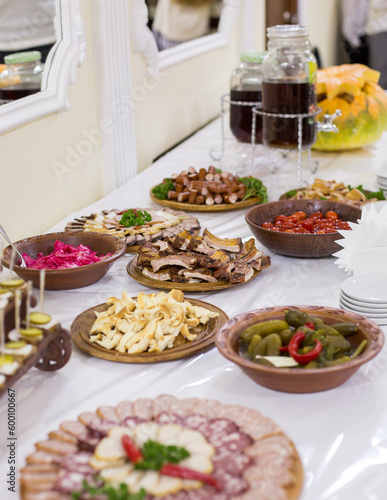 Buffet table. Various meat snacks. Wedding banquet, rich cuisine. Buffet. Appetizing snacks