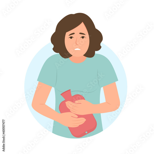 Woman feeling severe pain in the  abdomen. Girl holds rubber warmer with hot water.Pain during menstruation, cystitis, urethritis, incontinence or other problems of the urethra.