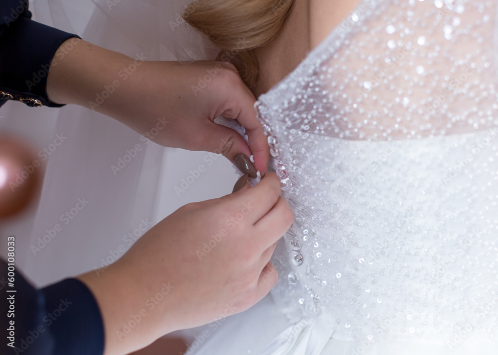 Bride in waiting. Wedding day, dress, preparation, hands, experience. Bride in waiting. Wedding day, dress, preparation, hands, experience.