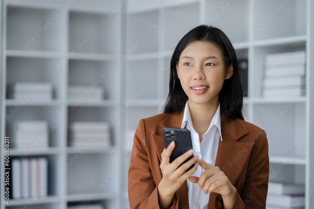 businesswoman working with smart phone.