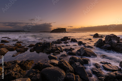 Rock formation and Stack Island view with sunrise glow at Minnamurra, NSW, Australia. © AlexandraDaryl