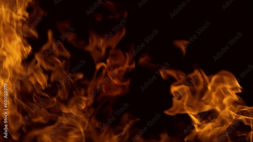 Flames of fire on black background in slow motion Flames of fire on black background in slow motion
