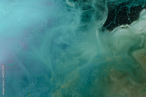 Abstract smoke background. Ink colors blot in water.