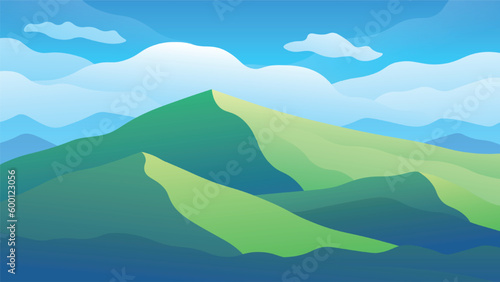 Beautiful high green mountains on blue sky background. Mountain ranges summer horizontal landscape.