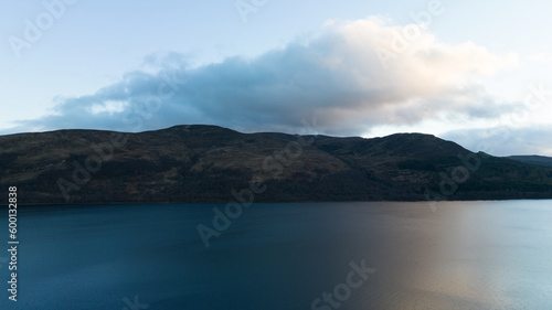 wonderful lake and sky view. Blue lake among the mountains and clouds in the sky