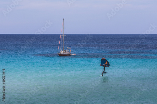 Beautiful sandy Cala Comte beach with azure blue sea water, Ibiza island, Spain photo