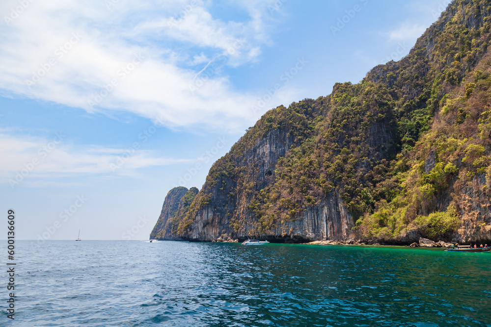 island phi phi leh and boat in thailand andaman sea. travel during vacation to the hot countries of asia.