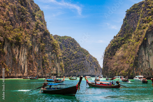A picturesque beautiful place on the island of Phi Phi Leh - Pi Leh Lagoon is popular for excursions with tourists on traditional Thai fishing boats. Island travel in Thailand. © Aleksandr Kondratov