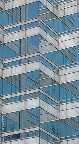 Reflections in a modern office glass building