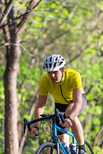 Young athlete during a bicycle race - vertical photo.