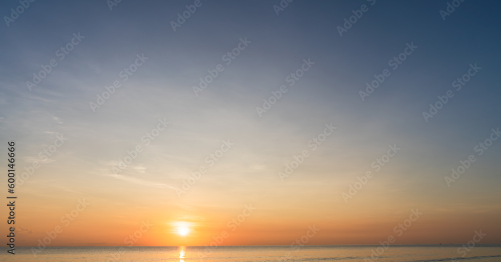 sunset over the sea in the morning with orange sunrise
