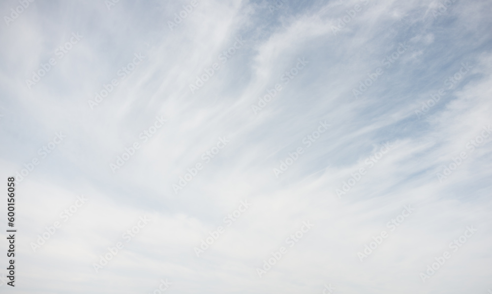 a breathtaking view of the sky with feathery clouds a breathtaking view of the sky with feathery clouds