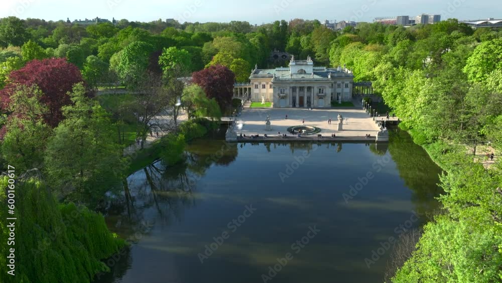 Aerial view of Lazienki Park in Warsaw, Poland on a sunny afternoon.
Royal Palace on the Isle - known as Baths Palace - divides the lake into two parts, a smaller northern lake and a larger southern. Aerial view of Lazienki Park in Warsaw, Poland on a sunny afternoon.
Royal Palace on the Isle - known as Baths Palace - divides the lake into two parts, a smaller northern lake and a larger southern.