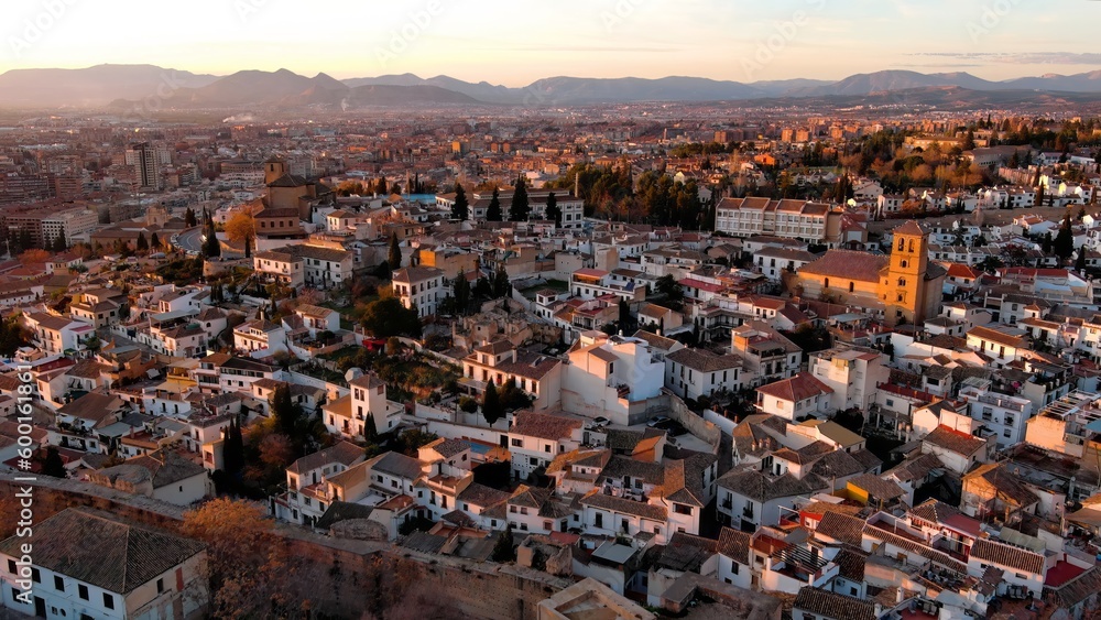 Aerial view of Granada city, Albaicin district at sunset, old Moorish quarter of the city, located on a hill facing the Alhambra. Andalusia, Spain Aerial view of Granada city, Albaicin district at sunset, old Moorish quarter of the city, located on a hill facing the Alhambra. Andalusia, Spain