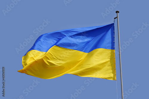 Ukrainian flag in the blue sky