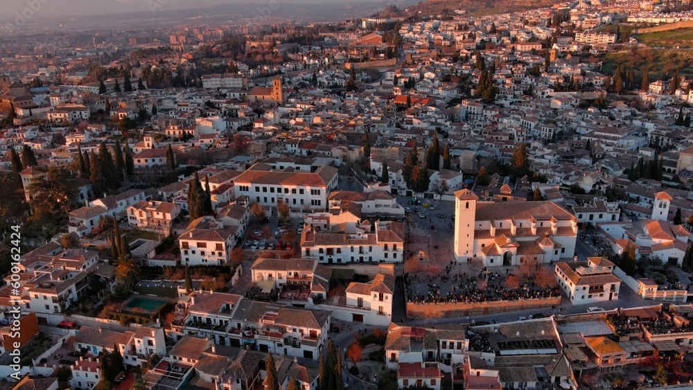 Aerial view of Granada city, Albaicin district at sunset, old Moorish quarter of the city, located on a hill facing the Alhambra. Andalusia, Spain