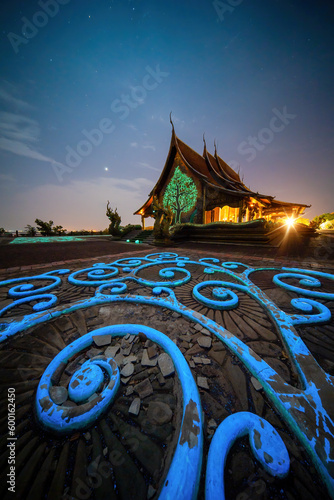 Sirindhorn Wararam Phu Prao is public Temple (Wat Phu Prao) at night ,It will appear green, blue glow in the night at Sirindhorn district of Ubonratchathani Thailand. Amazing temple in evening, Asia photo