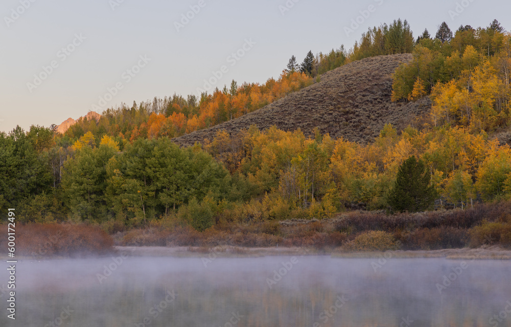 Scenic Autumn Reflection Landscape in the Tetons at Sunrise Scenic Autumn Reflection Landscape in the Tetons at Sunrise