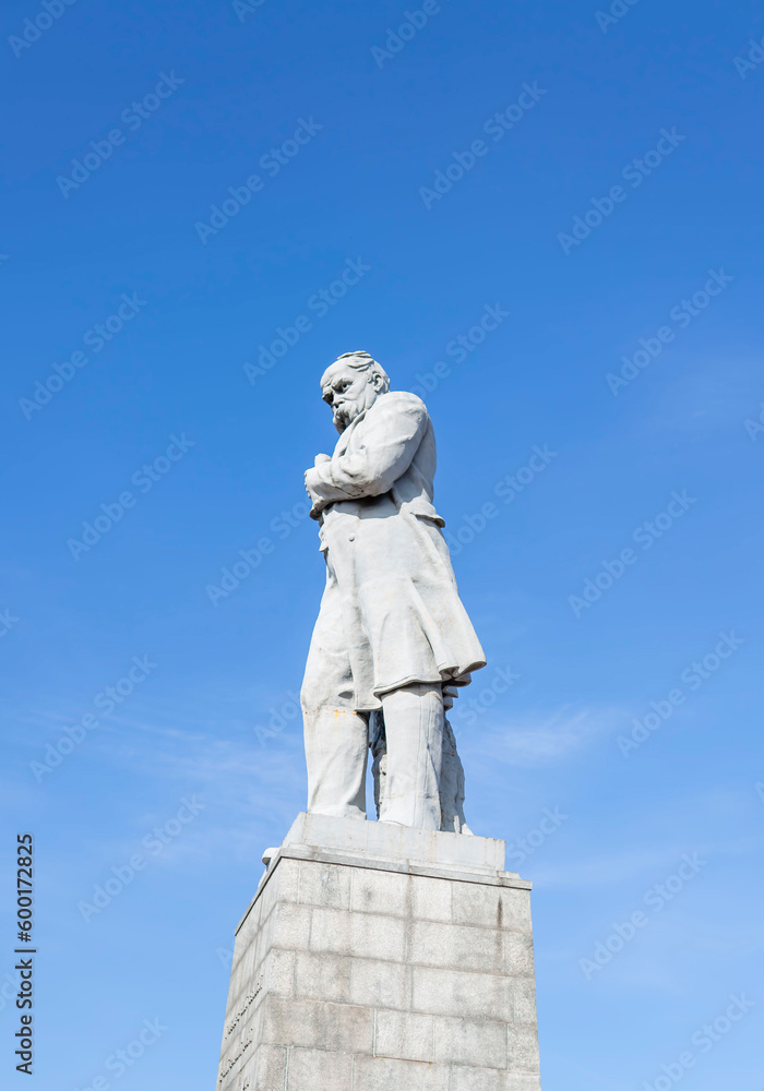 statue of Taras Shevchenko against the background of the blue sky, Ukraine