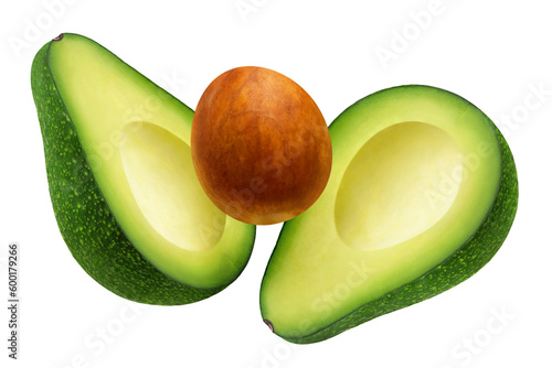 Two halves of a green avocado and the core of the fruit levitate on a transparent background.