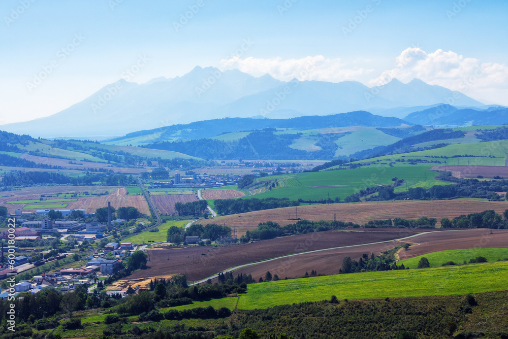 scenic rural tatra mountain landscape in slovakia. agricultural fields in the valley