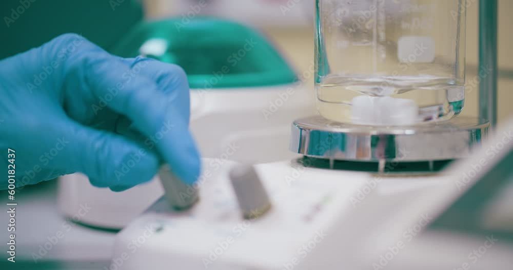 Laboratory worker researcher conducting research on cancer Laboratory worker researcher conducting research on cancer