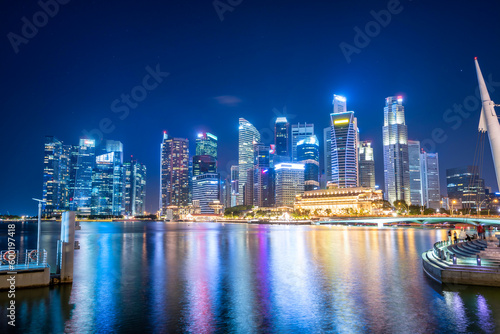 Singapore Skyline and view of skyscrapers on Marina Bay at twilight time. © nuttawutnuy