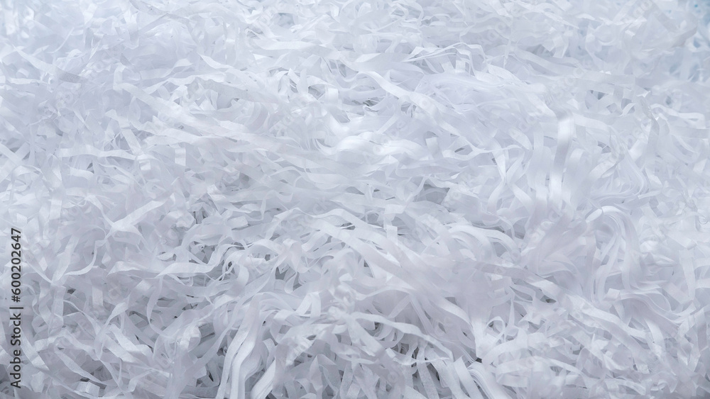 Background of white shredded paper. Paper strips. Background of white shredded paper. Paper strips.
