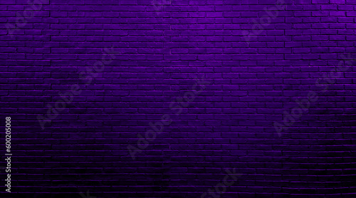 neon purple brick wall texture for pattern background. abstract architectural wide panorama brick work wall for rustic, industrial, loft, futuristic design in close up view.