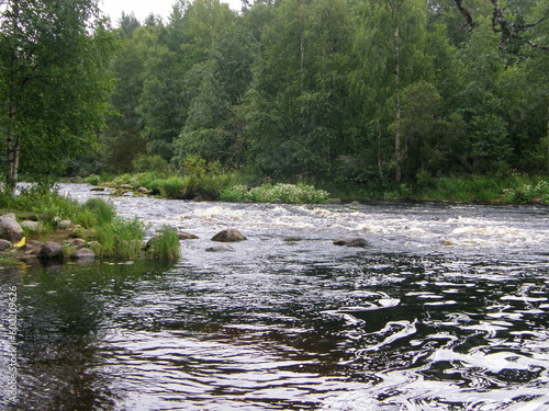 Bubbling water on the rapids of the Vidlitsa River. Republic of Karelia.
