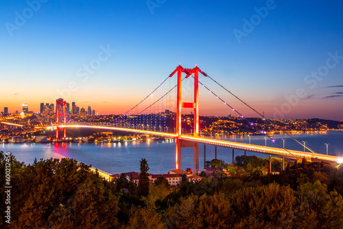 Istanbul sunset from most famous and touristic destination Nation Park in Nakkastepe. 15th July Martyrs Bridge (15 Temmuz Sehitler Koprusu). Istanbul Bosphorus Bridge Romantic landscape Istanbul City
