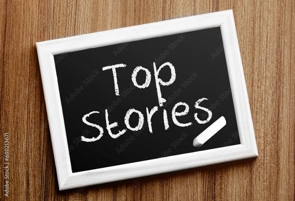 Fototapeta premium Сhalkboard with text Top Stories
