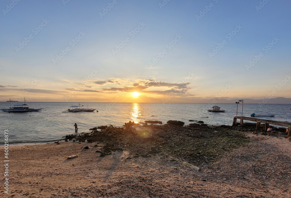 scenic sunset over the pacific ocean at moalboal cebu island