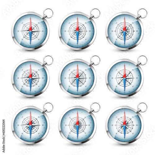 Vintage compass, marine wind rose with cardinal directions of North, East, South, West. Realistic silver navigational compass, shiny metal. Cartography and navigation. Vector illustration.