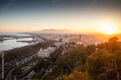 view over Malaga at sunset travel banner