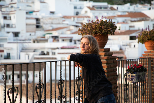woman strolling in picturesque village of Mijas. Costa del Sol Andalusia Spain