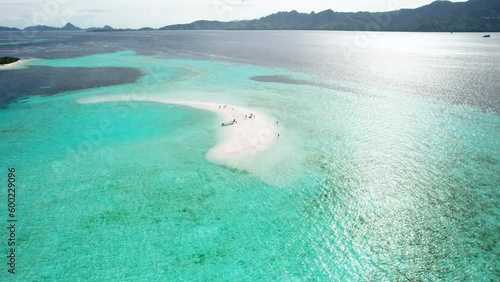 Aerial video on Snake Island Indonesia Aerial view showing boats and tourists enjoying Snake Island photo