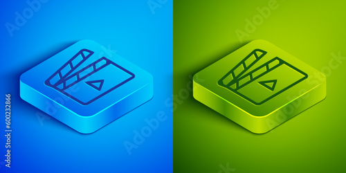 Isometric line Movie clapper icon isolated on blue and green background. Film clapper board. Clapperboard sign. Cinema production or media industry. Square button. Vector